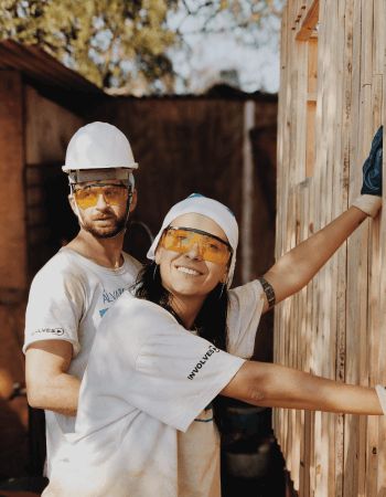 Trainee and supervisor showing on-the-job training at worksite.