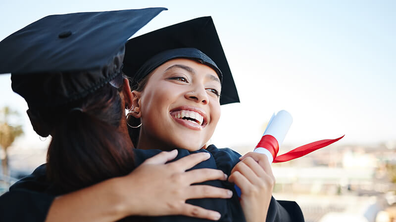 https://staging-luminafoundation-staging.kinsta.cloud/wp-content/uploads/2023/01/graduates-hugging.jpg
